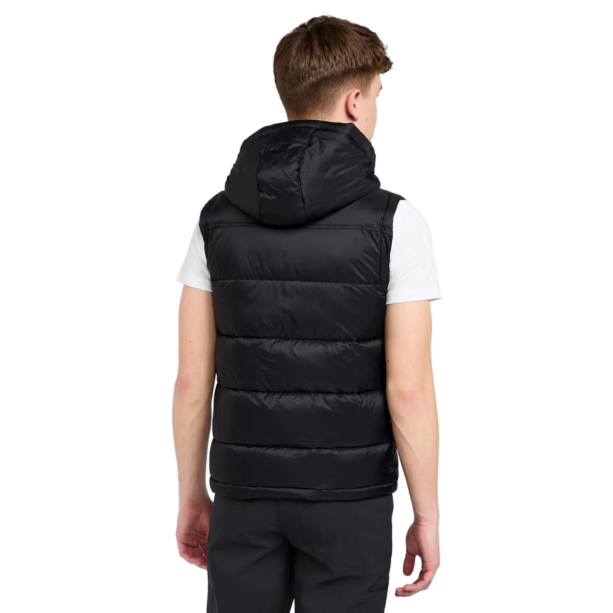 Person wearing a black puffer vest on a white background