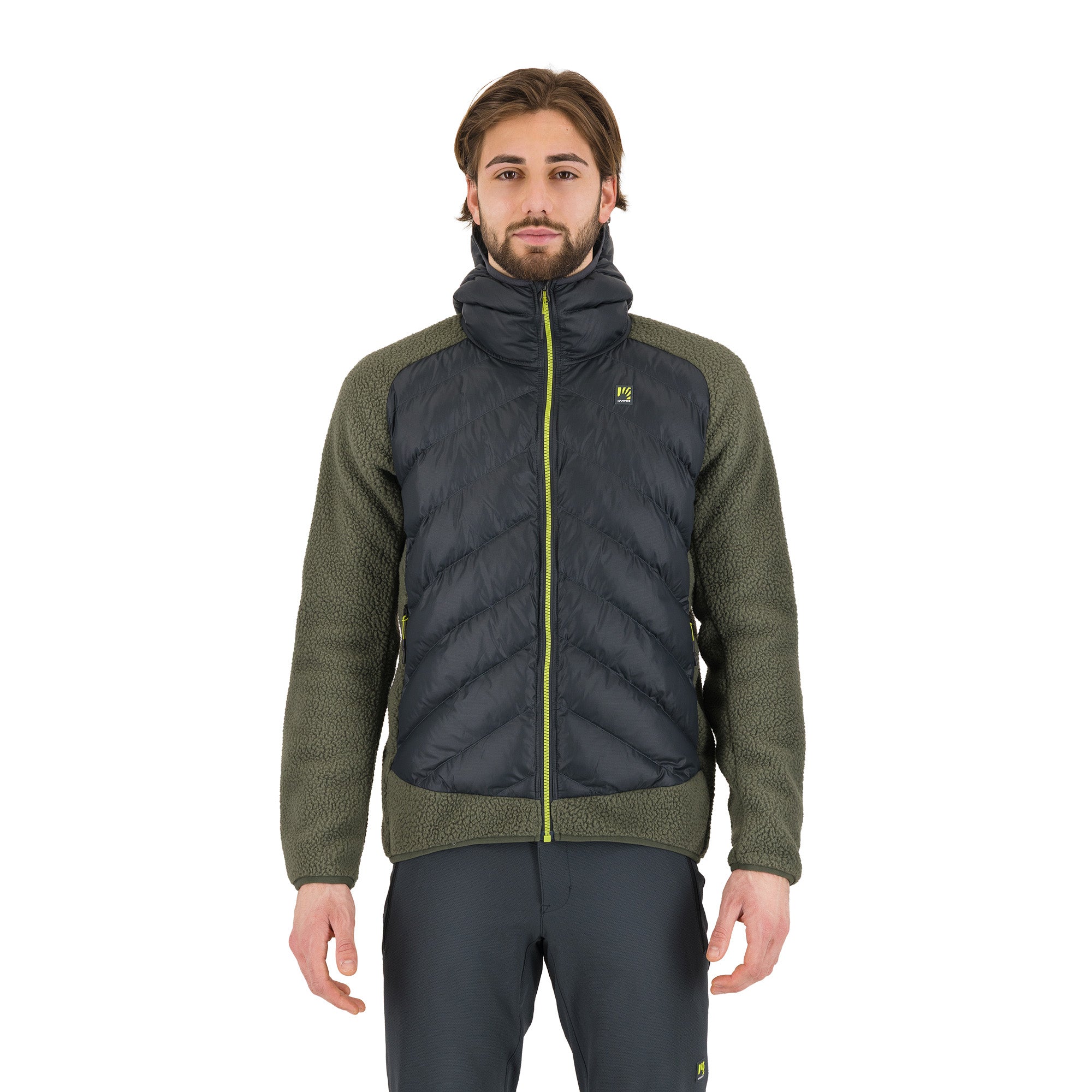 Man wearing a green and black jacket on a white background