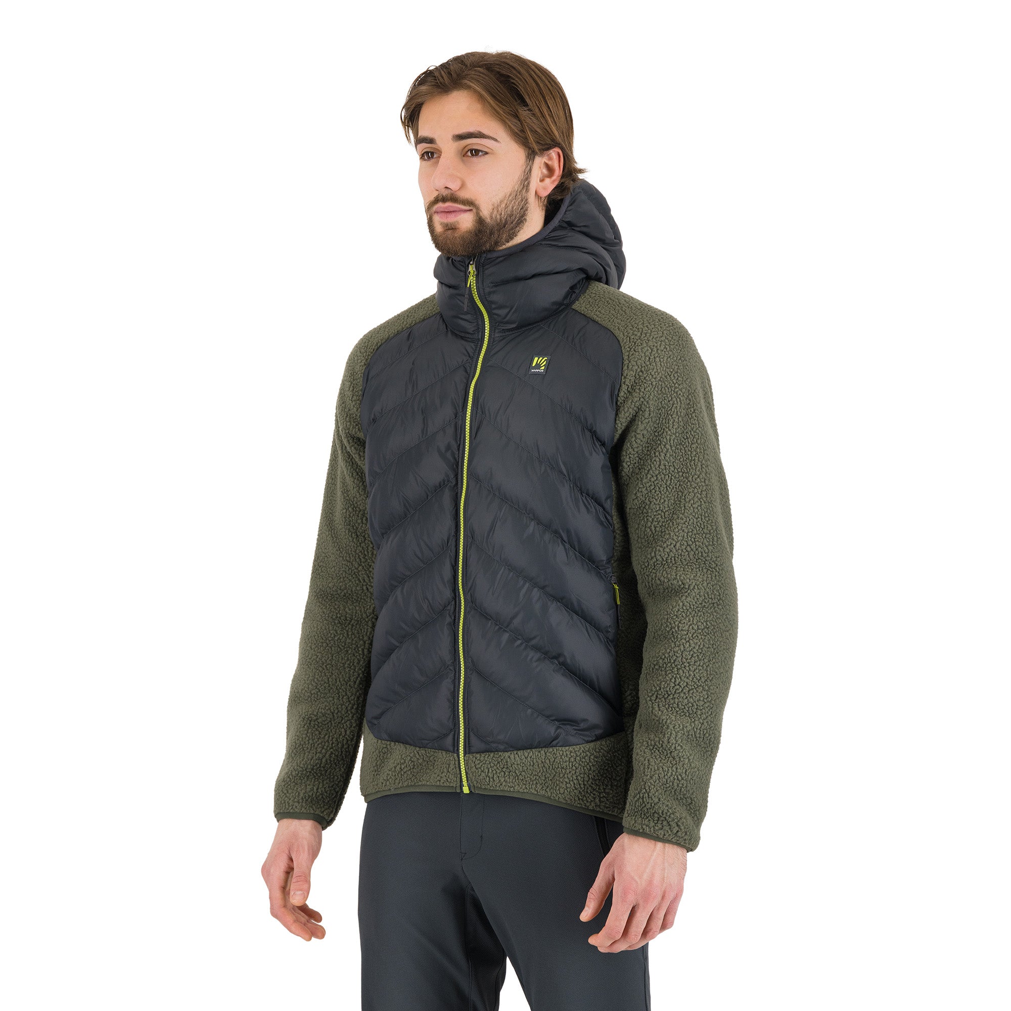 Man wearing a green and black jacket on a white background