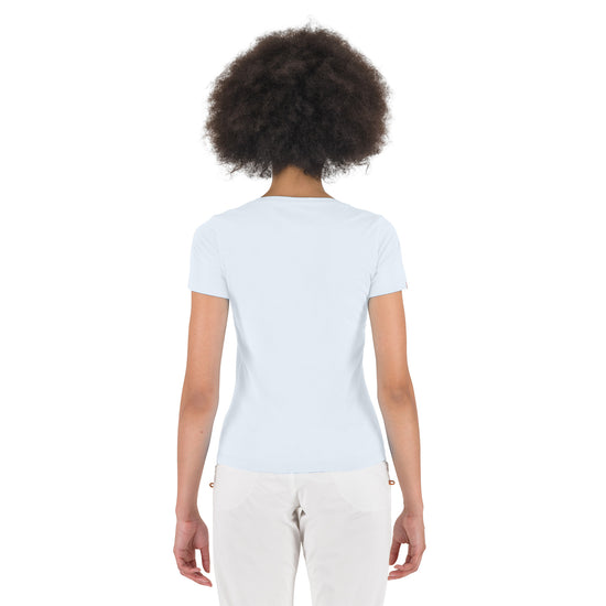 Person wearing a white t-shirt on a white background
