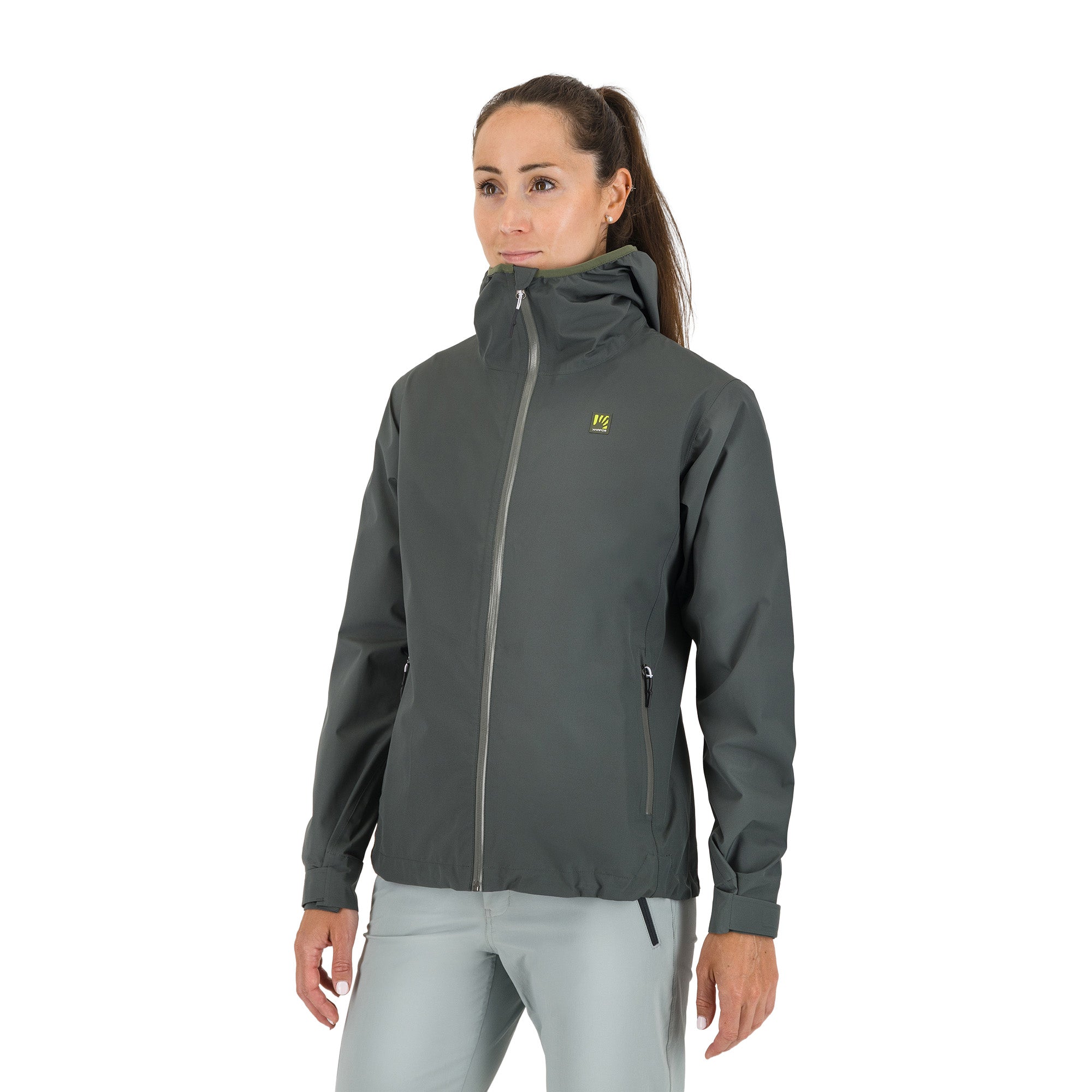 Woman wearing a grey jacket on a white background