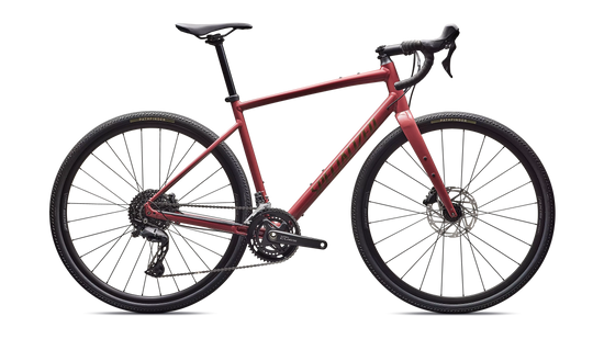 Red gravel bike with a Specialized logo
