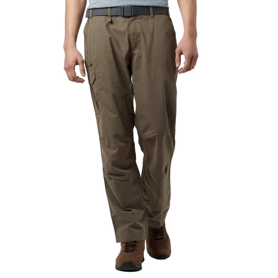 A man wearing brown walking trousers