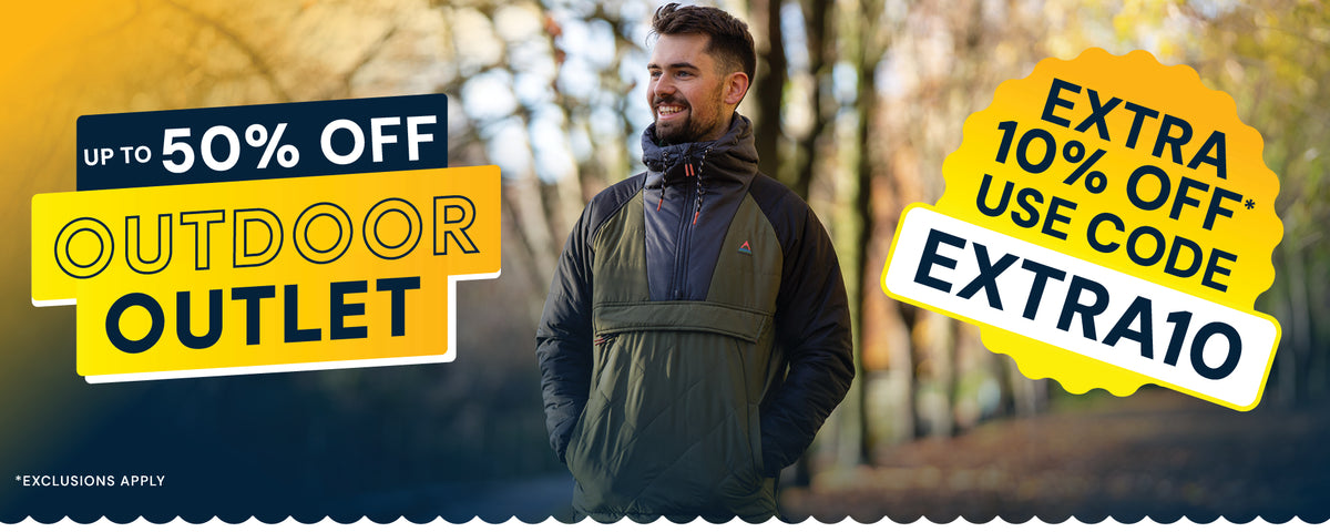 Up to 50% off Outdoor Outlet styles, plus an extra 10% off with code EXTRA10, shown alongside a person wearing an outdoor jacket.