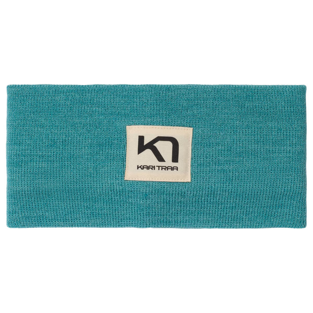 Teal headband with a Kari Traa logo on the front on a white background