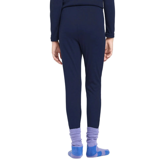 Person wearing navy leggings and blue socks on a white background