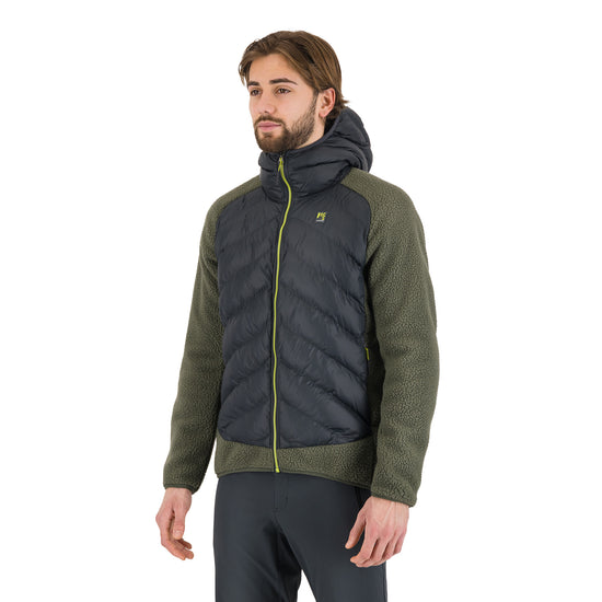 Man wearing a green and black jacket on a white background