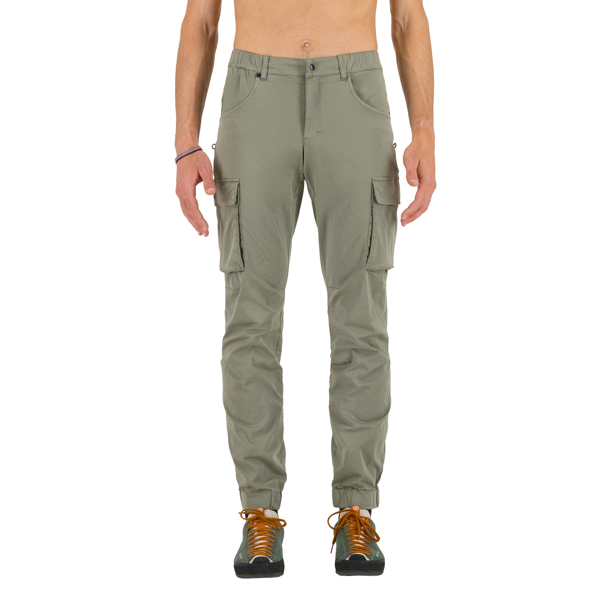 Person wearing olive green cargo pants on a white background