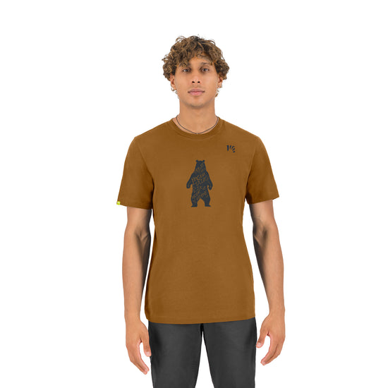 Man wearing a brown t-shirt with a bear graphic on a white background