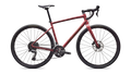Red gravel bike with a Specialized logo