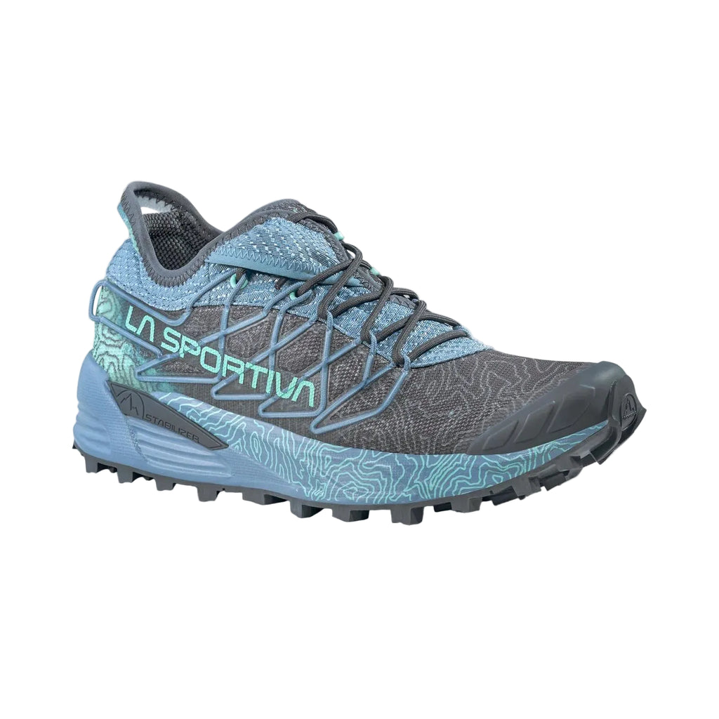 A La Sportiva trail running shoe in gray and light blue, featuring a patterned design and the La Sportiva brand name on the side, set against a light gray background.