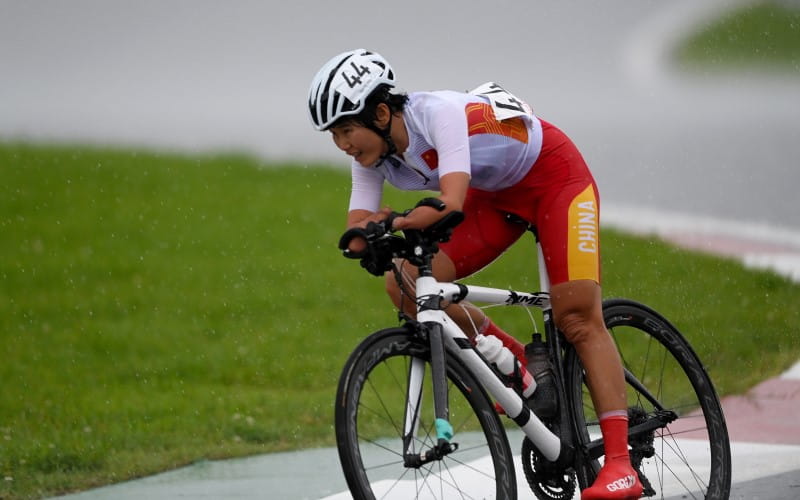 A para-cyclist and competes in a road race